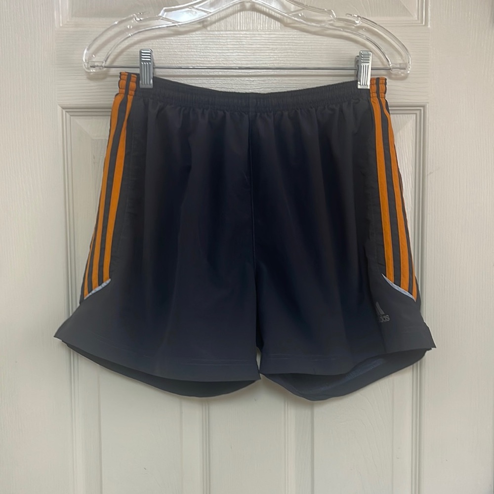 Adidas climate size medium shorts. Charcoal gray with orange stripes.